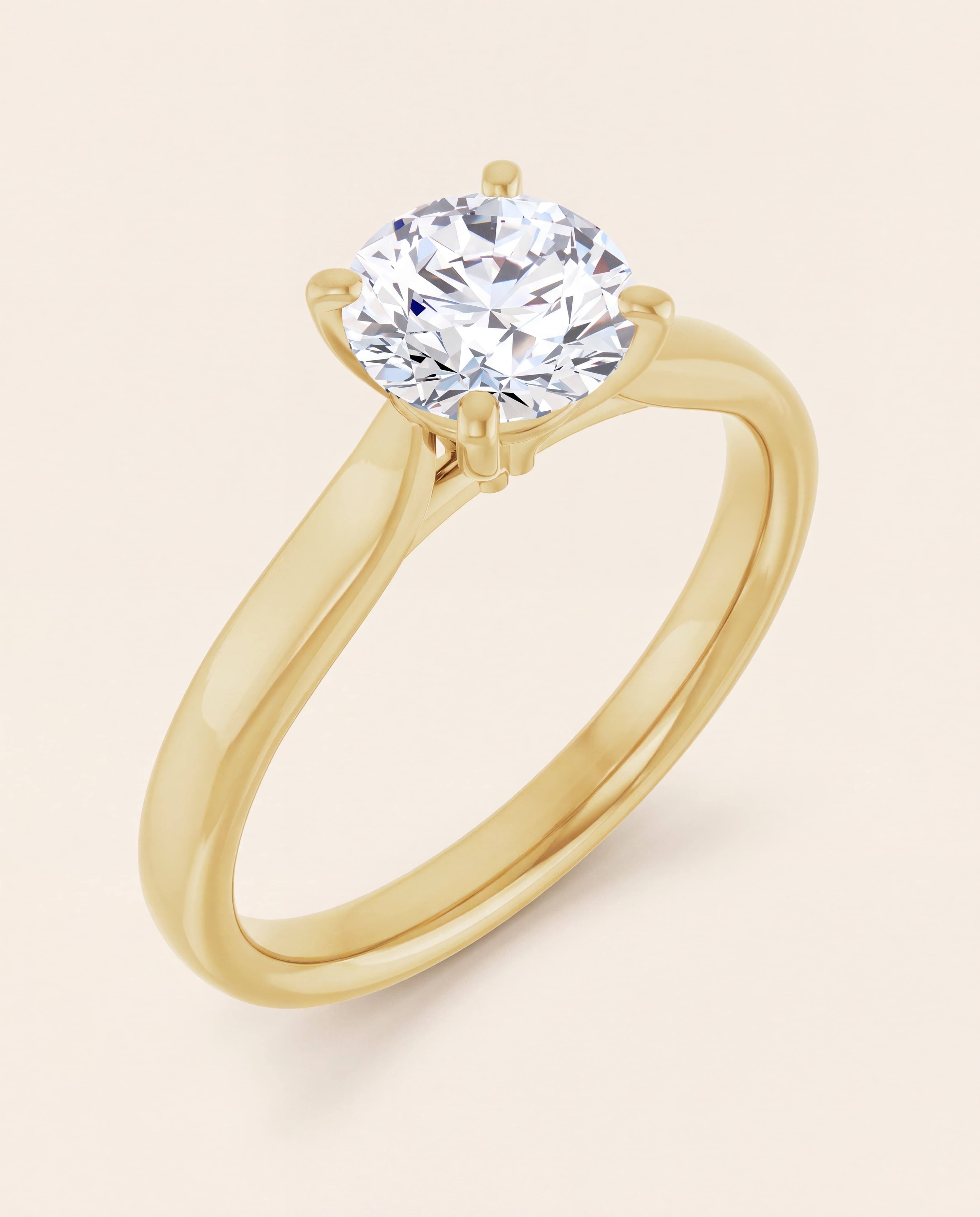 Classic Round Solitaire Engagement Ring in yellow gold