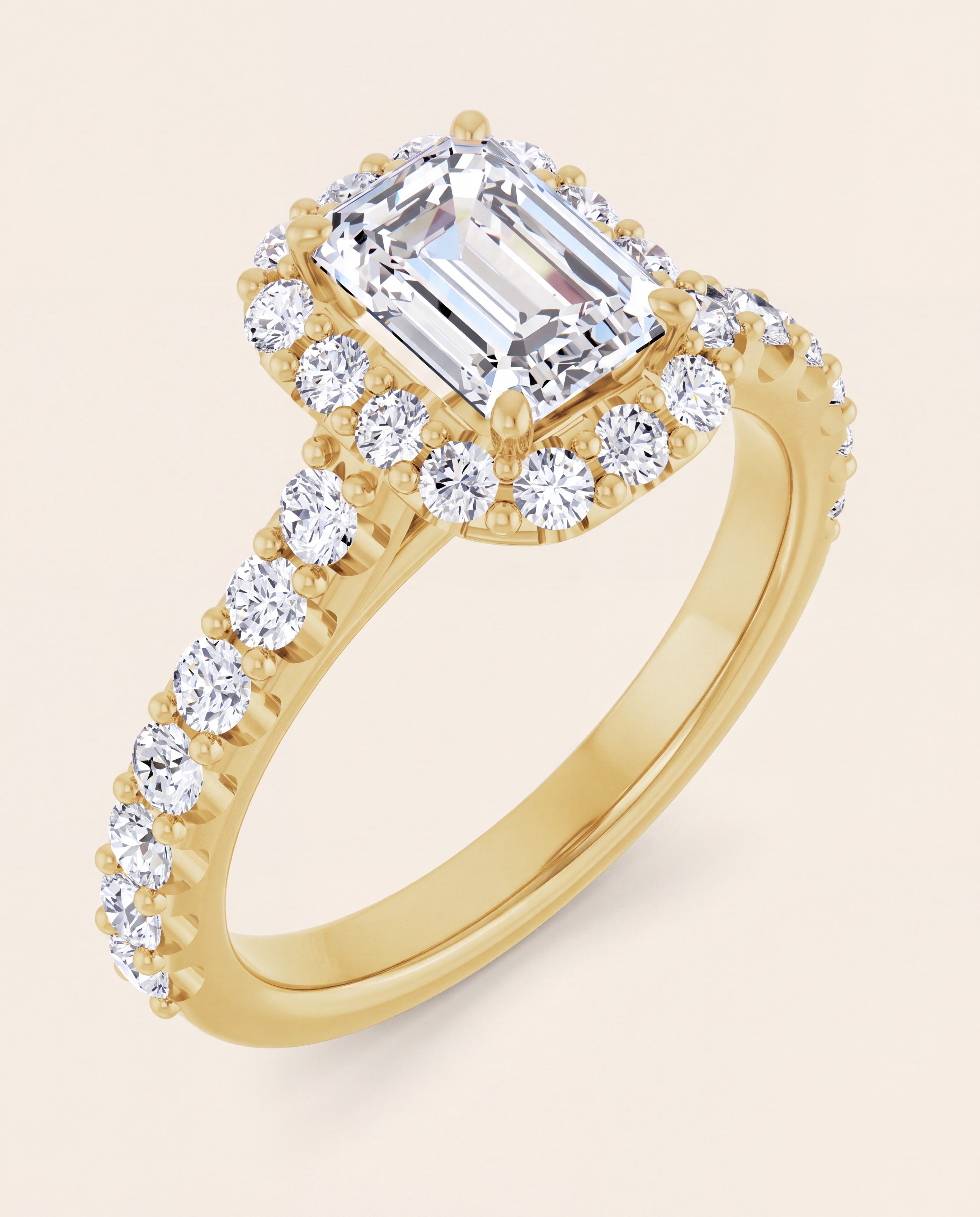 Emerald Cut Halo Engagement Ring in yellow gold