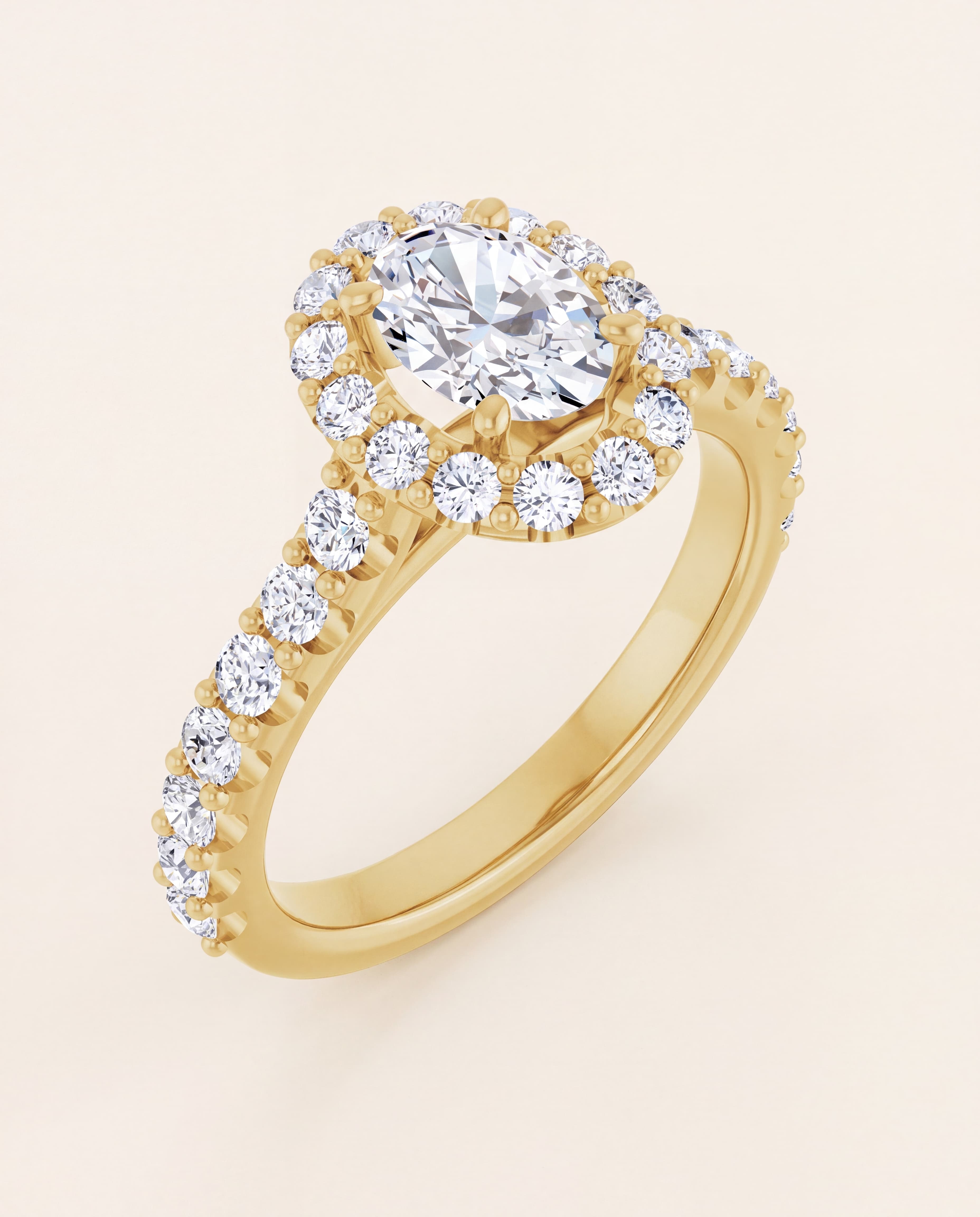 Oval Halo Engagement Ring in yellow gold
