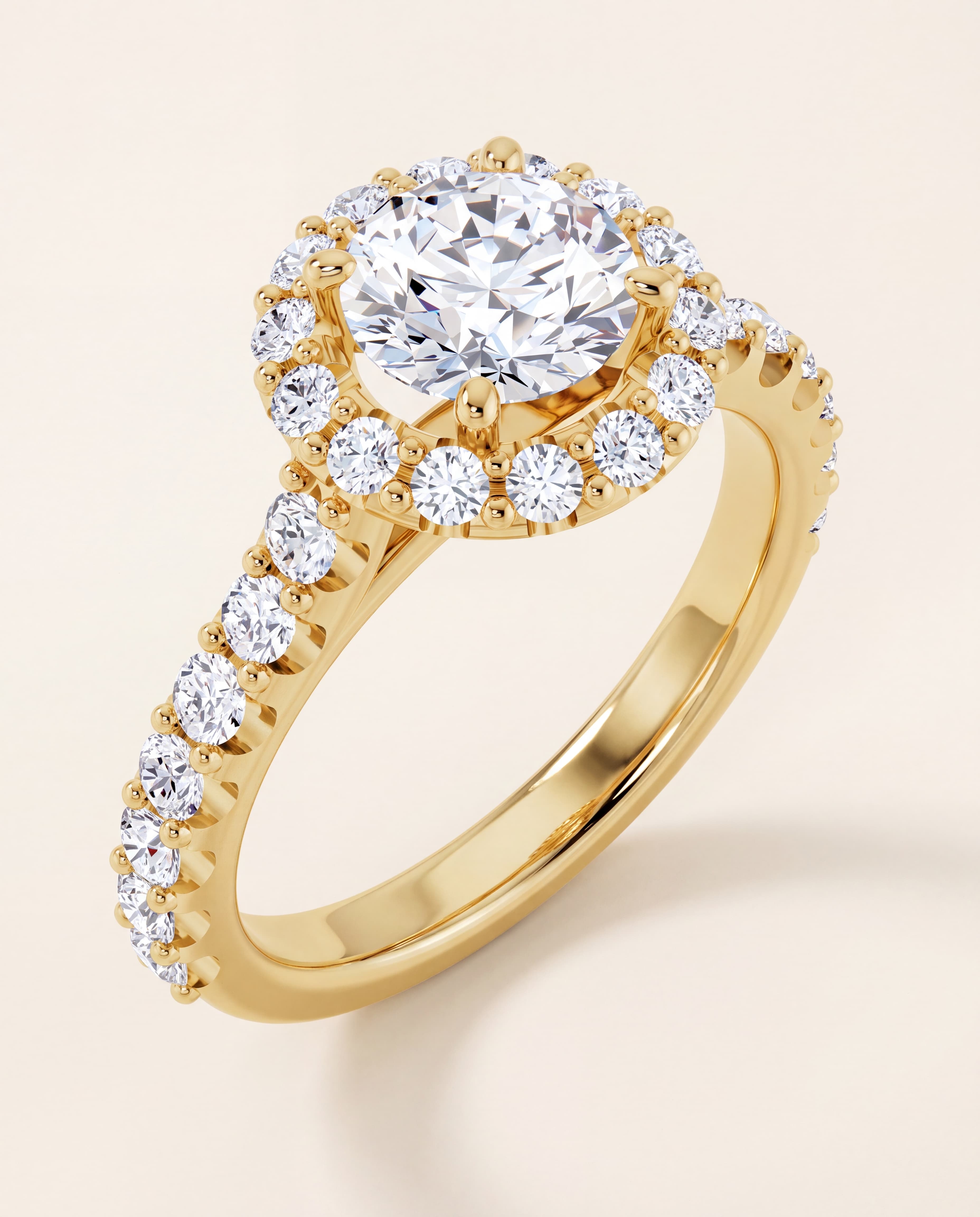 Round Halo Engagement Ring in yellow gold