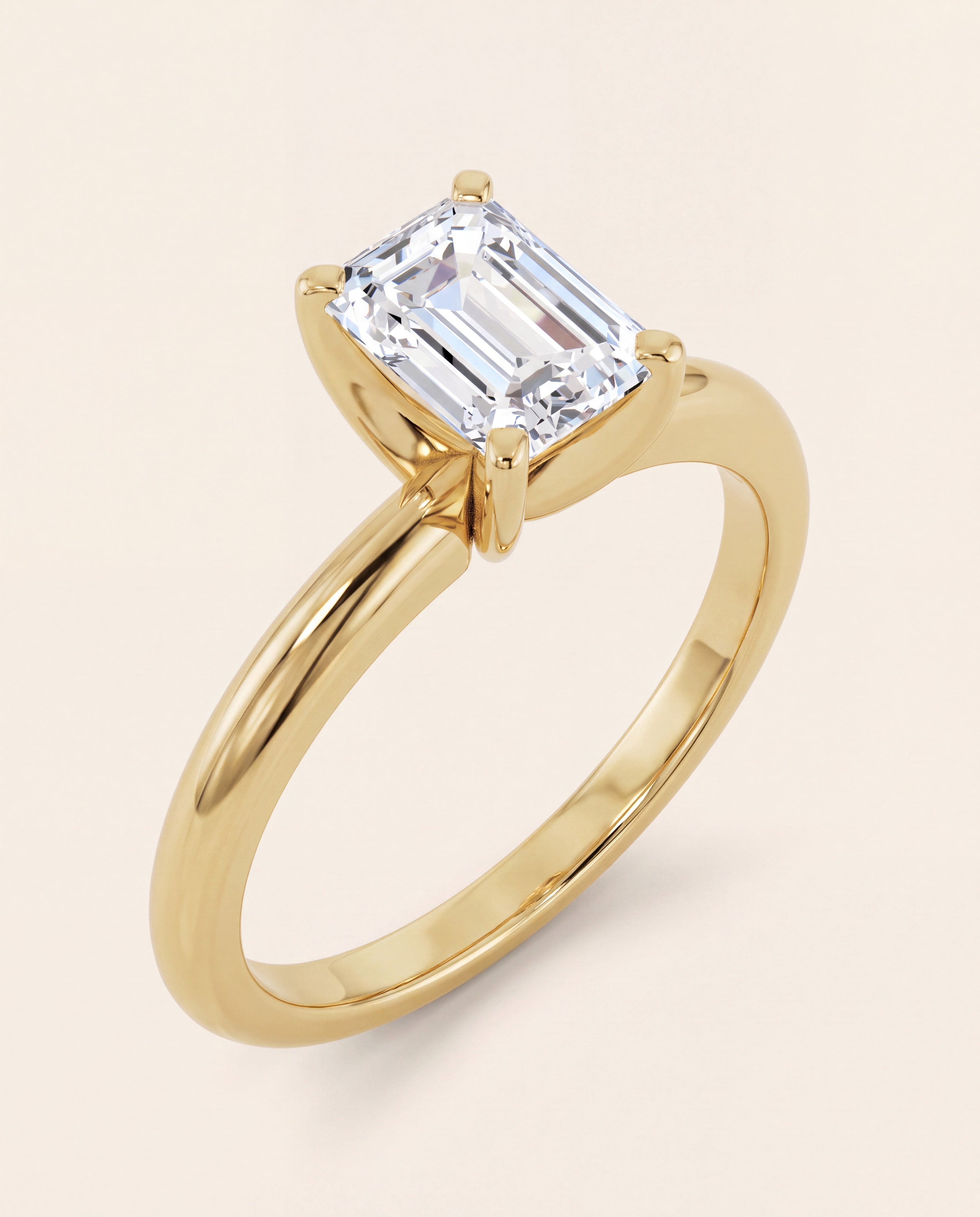 Emerald Cut Solitaire Engagement Ring in yellow gold