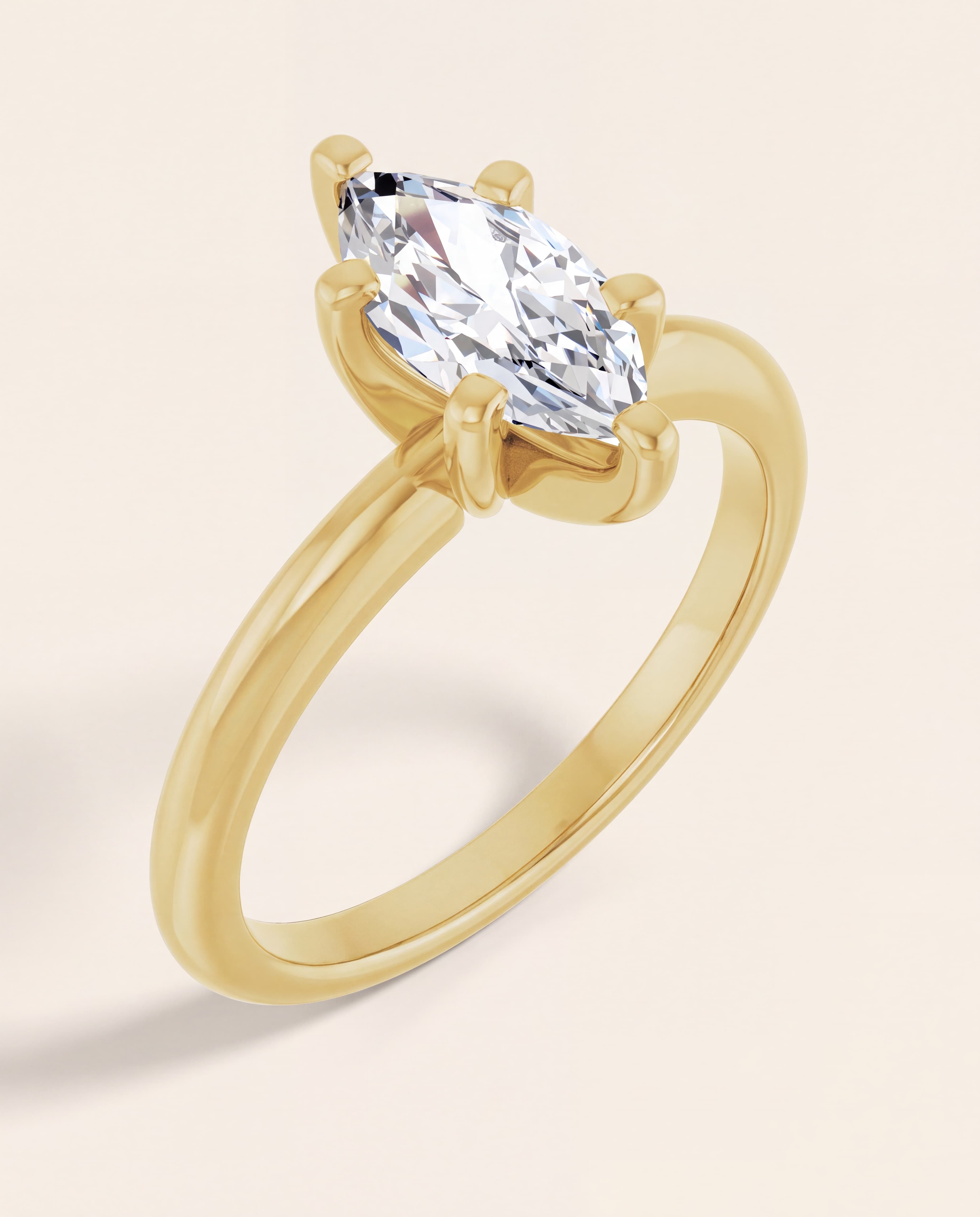 Marquise Solitaire Engagement Ring in yellow gold