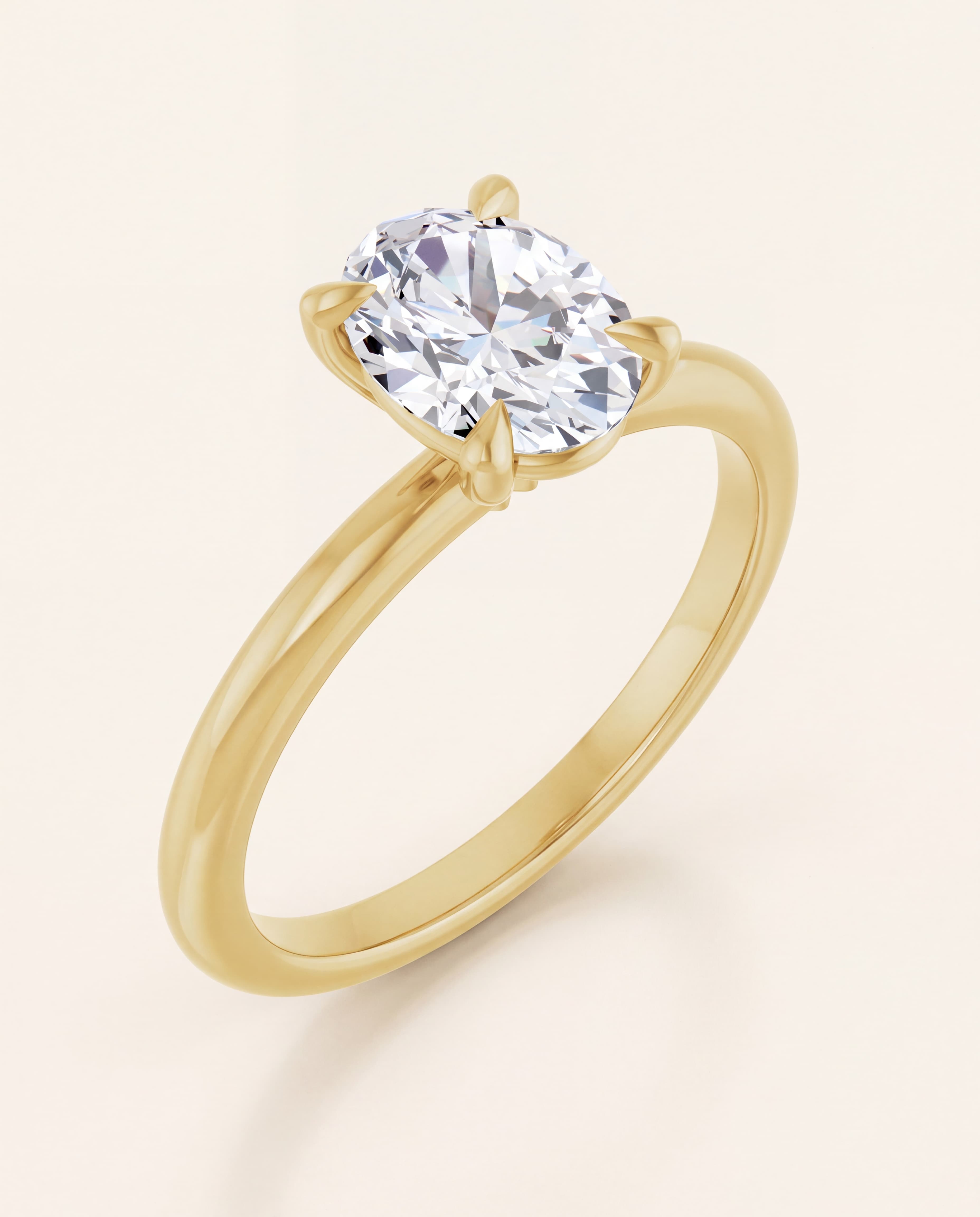 Oval Solitaire Engagement Ring in yellow gold