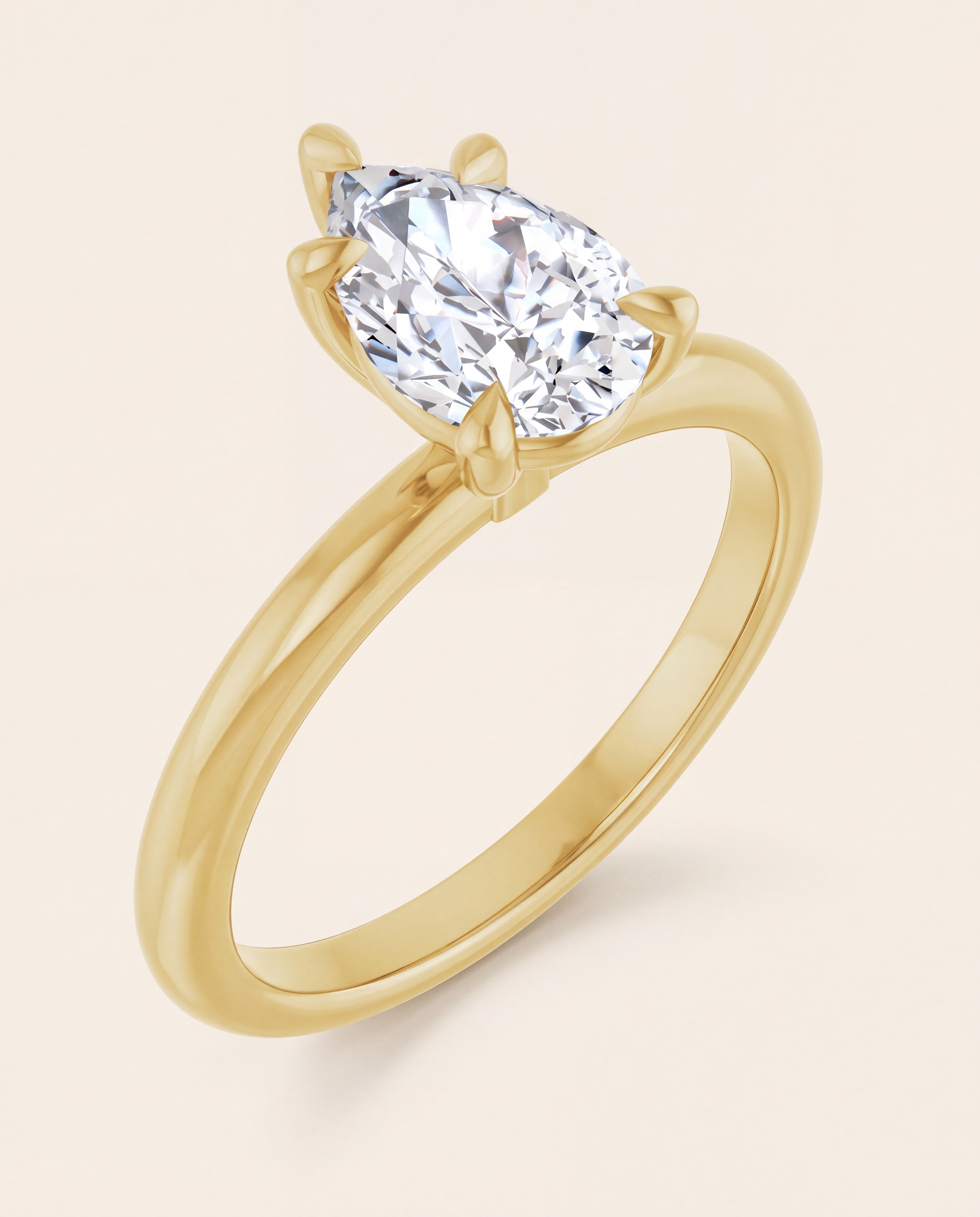 Pear Solitaire Engagement Ring in yellow gold