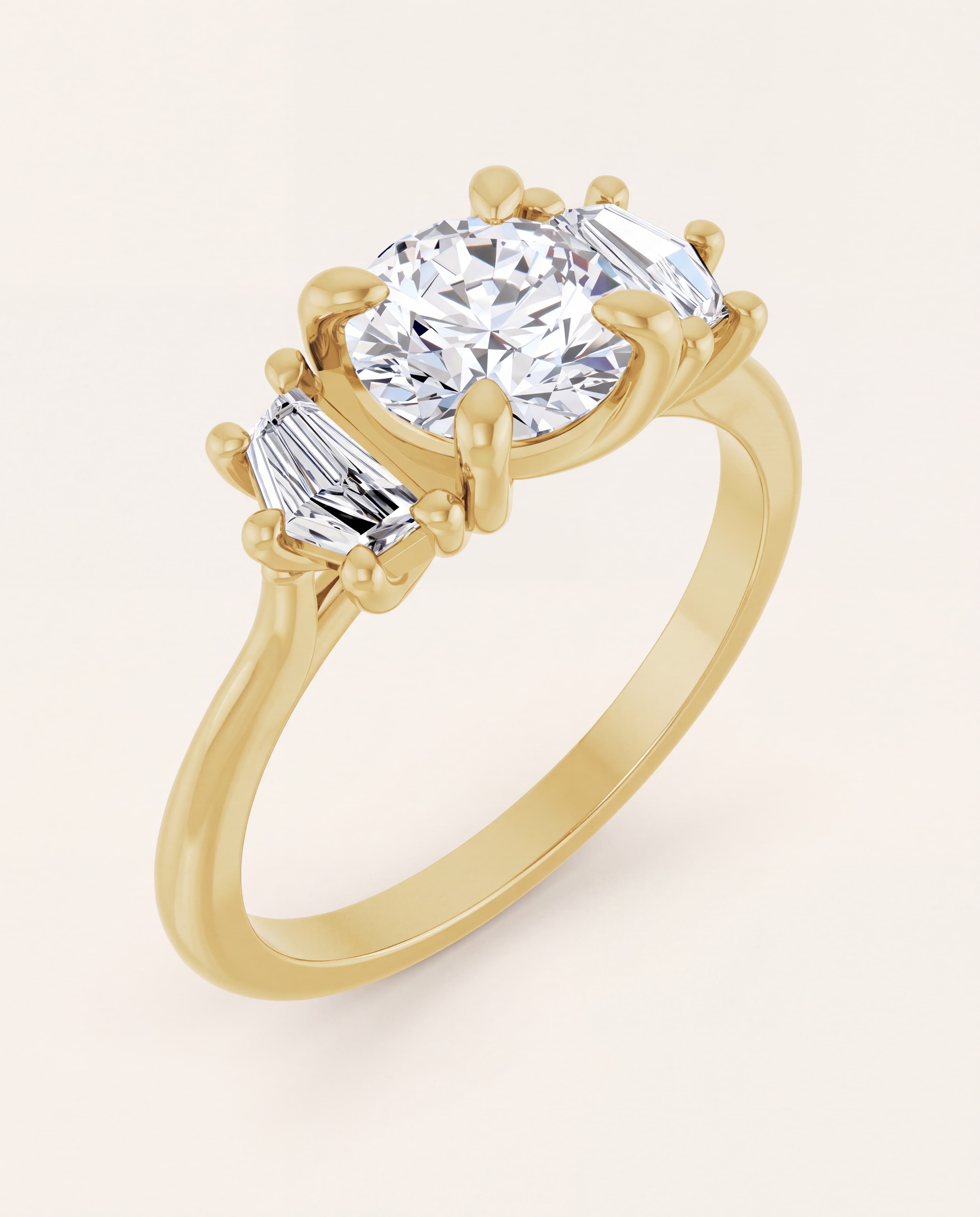 Round Three Stone Engagement Ring in yellow gold