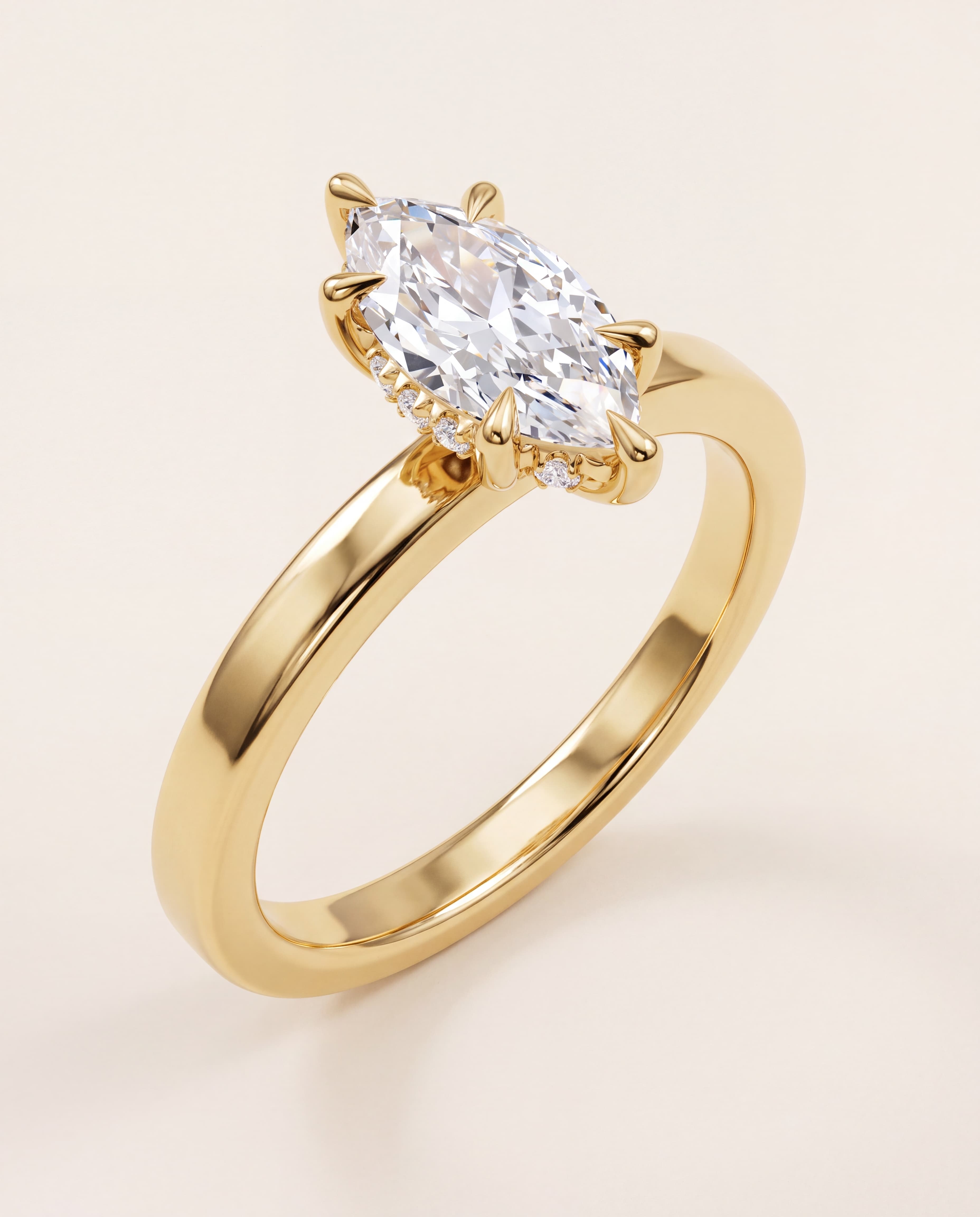 Hidden Halo Marquise Engagement Ring in yellow gold