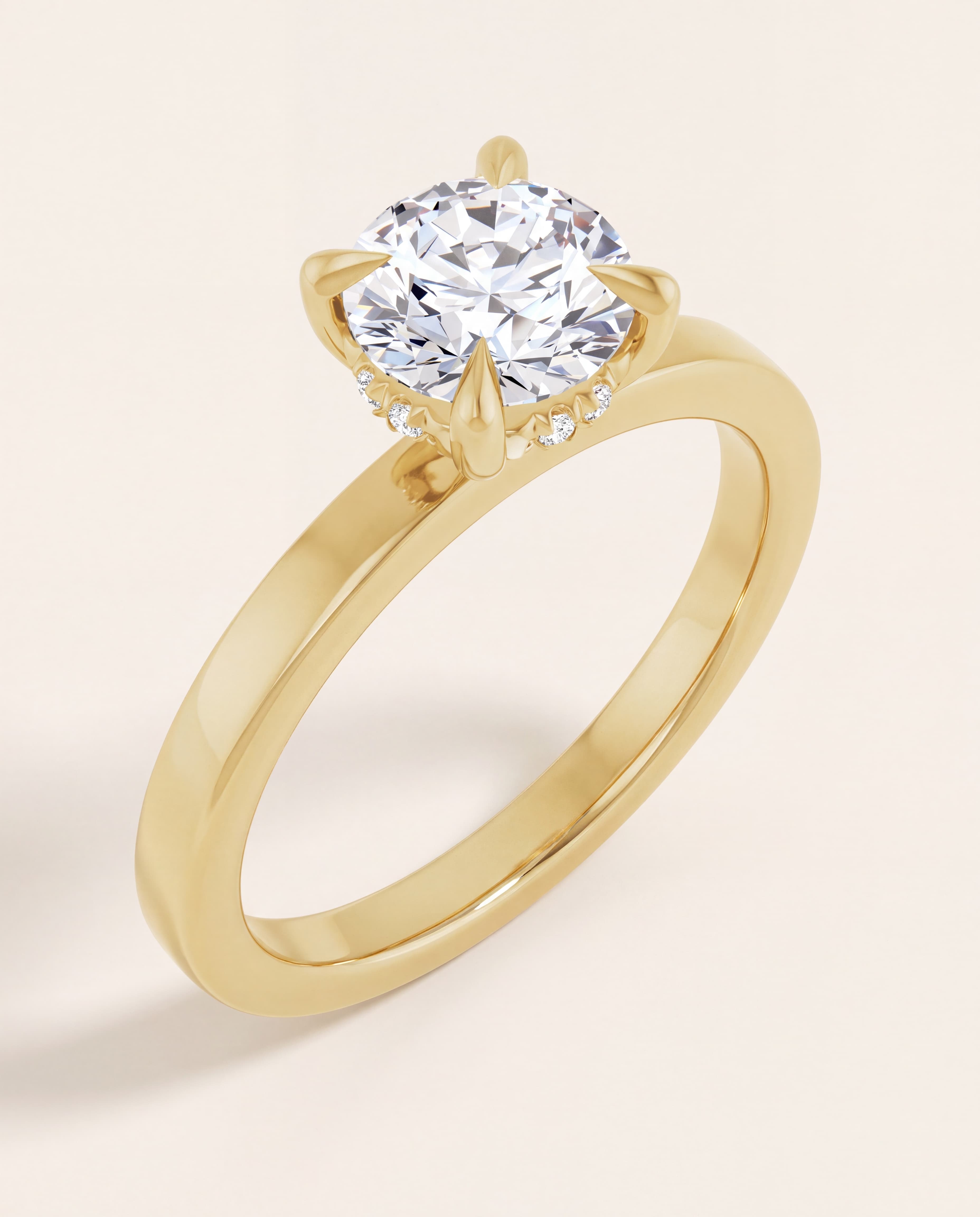 Hidden Halo Round Engagement Ring in yellow gold