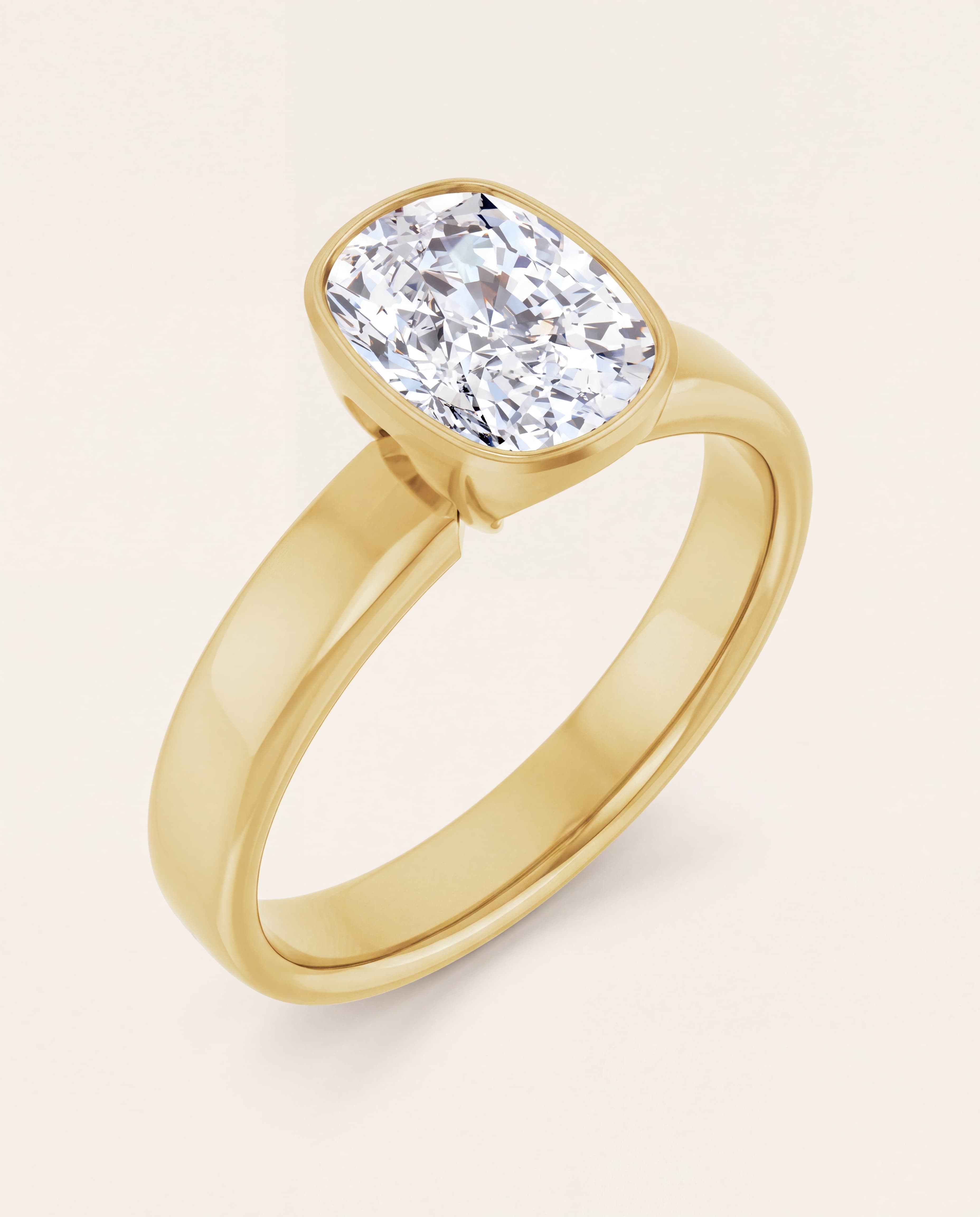 Bezel Set Cushion Engagement Ring in yellow gold