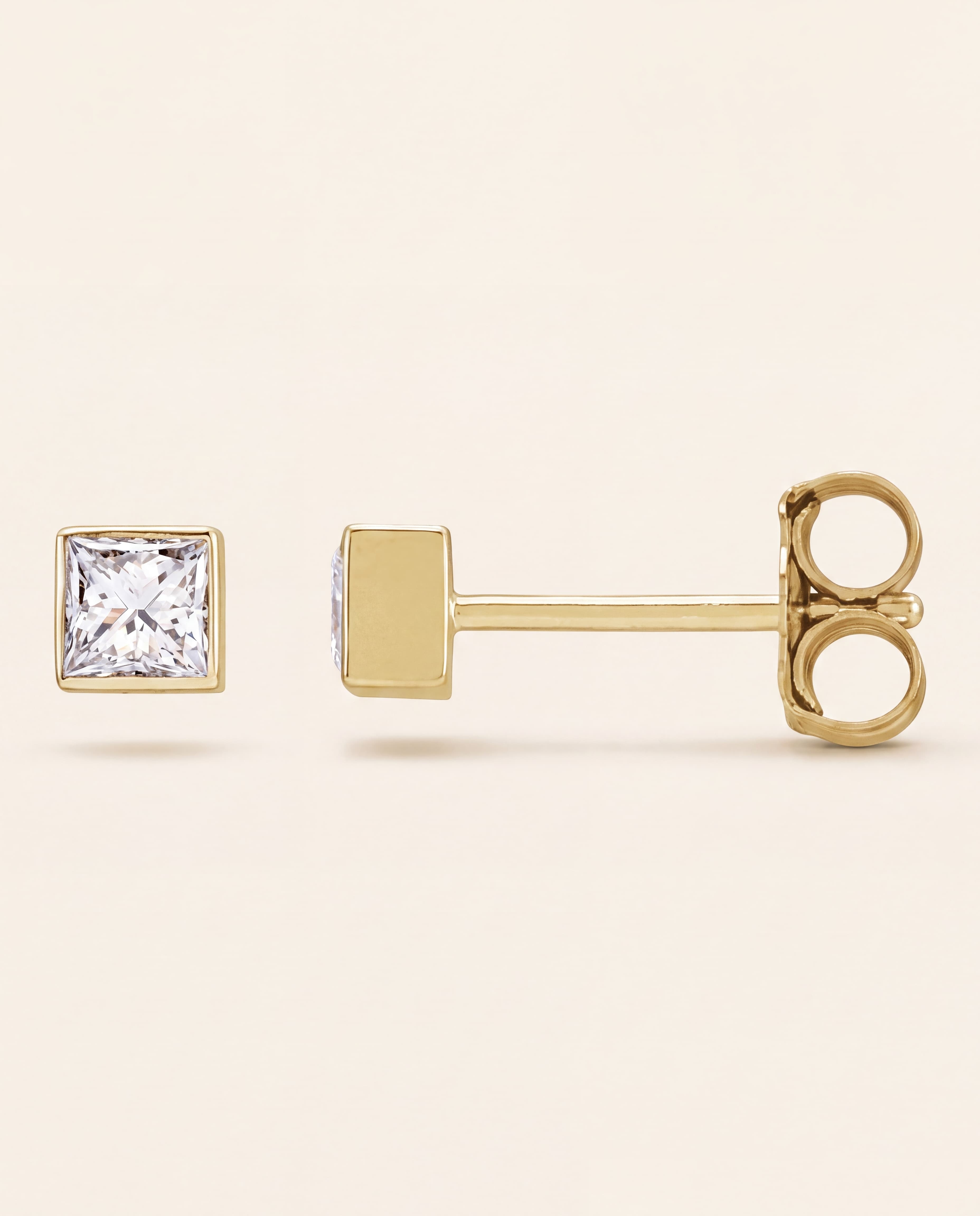 Princess Bezel Stud Earrings in yellow gold