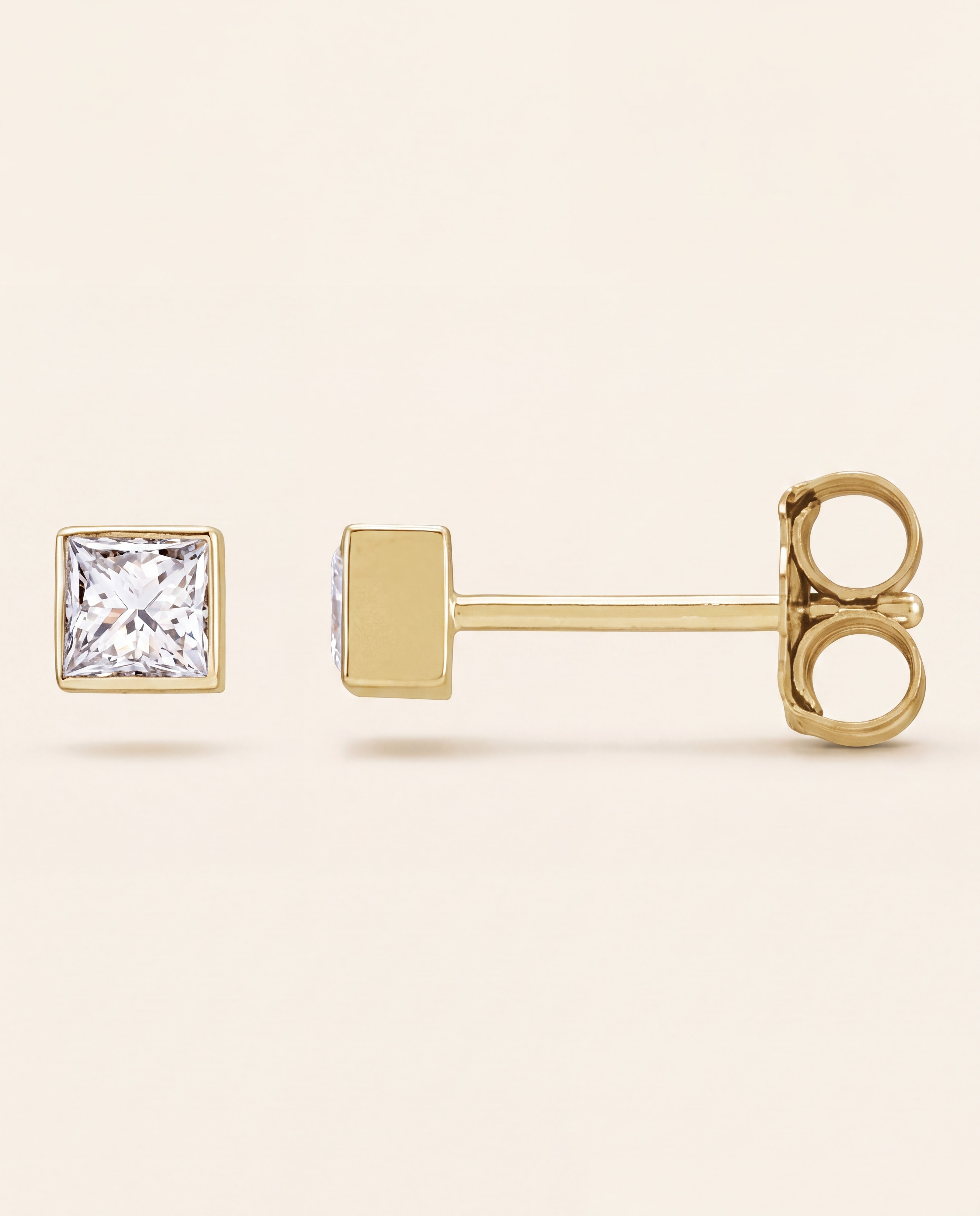 Princess Bezel Stud Earrings in yellow gold