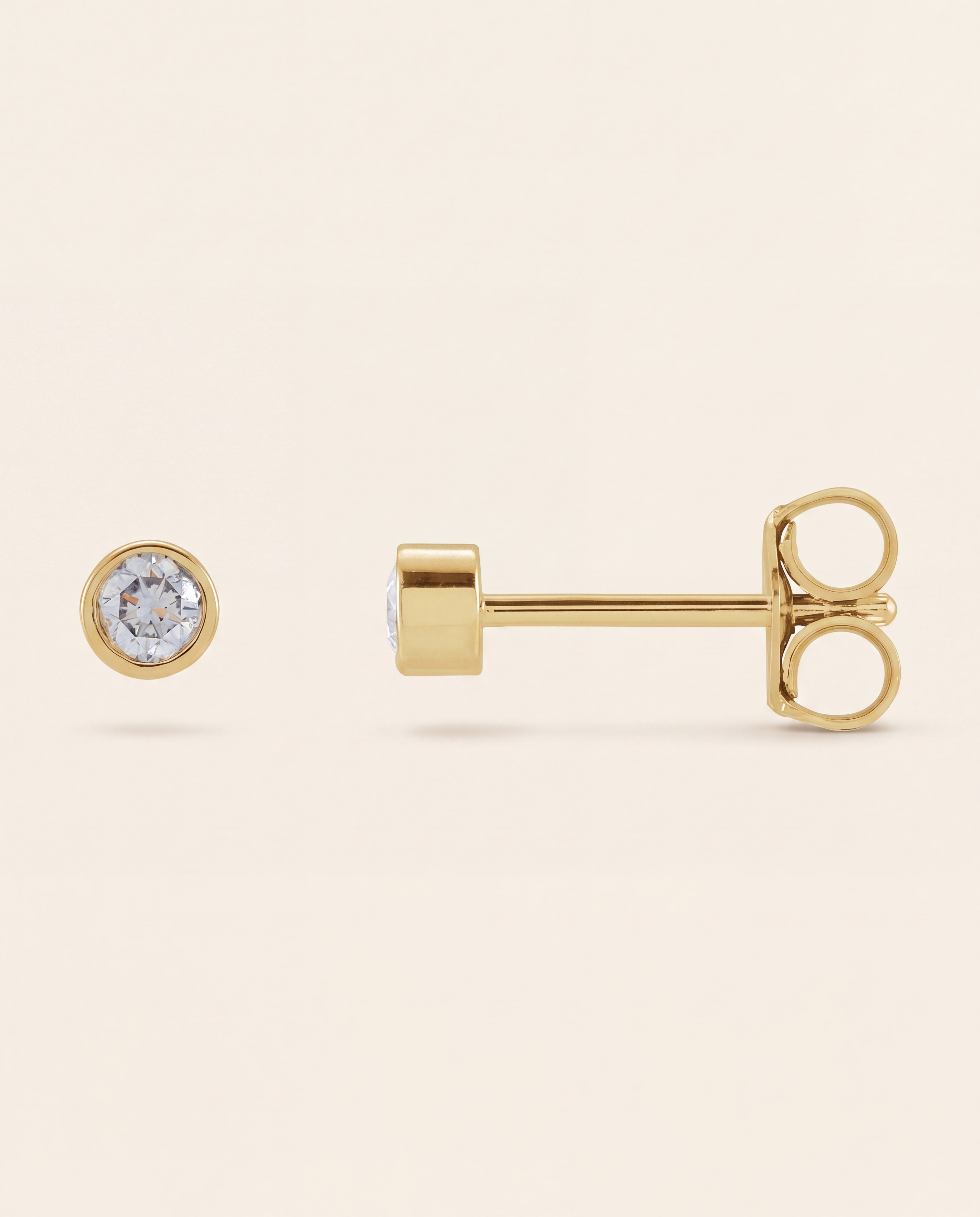 Bezel Set Round Lab-Grown Diamond Studs in yellow gold