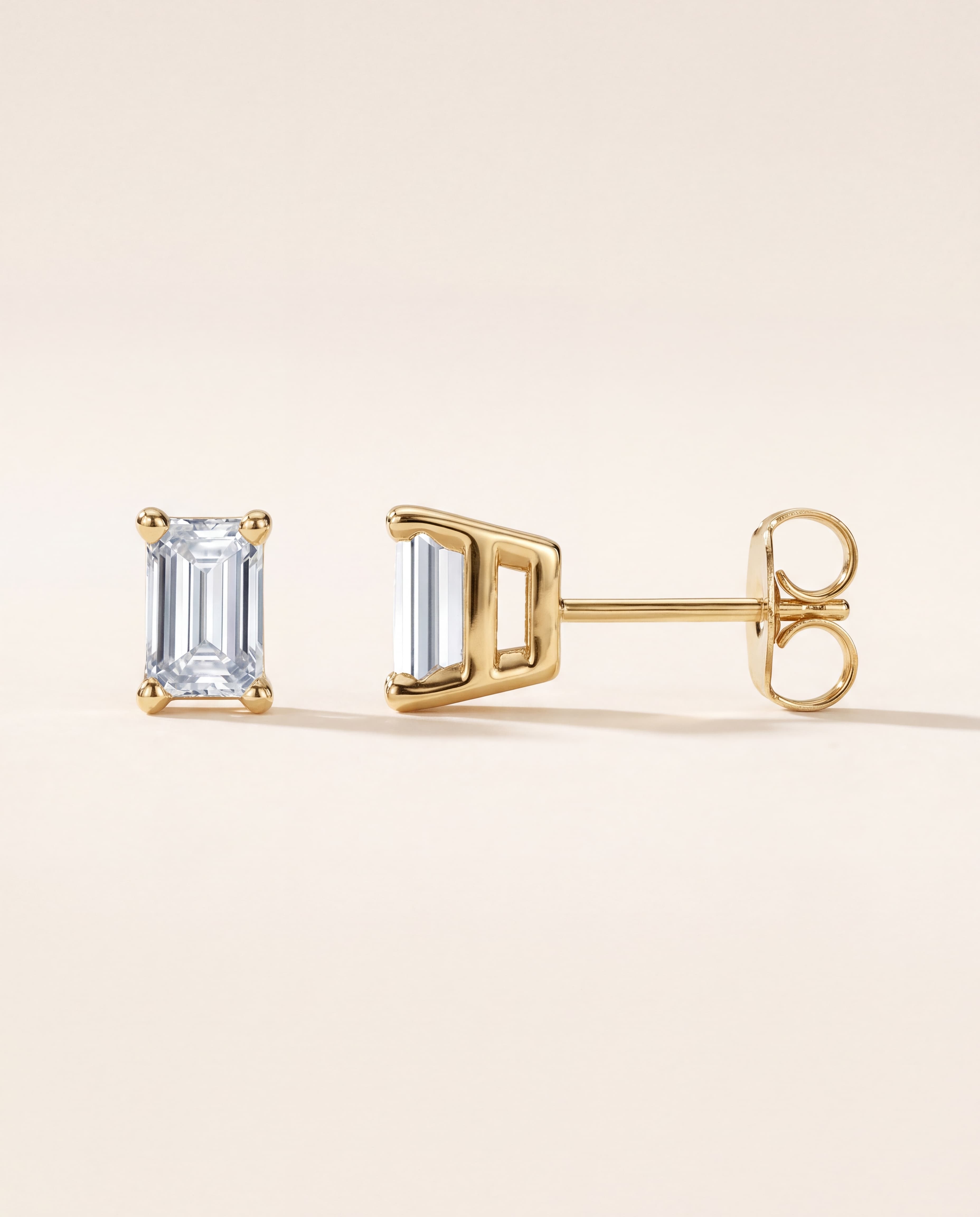 Emerald Cut Stud Earrings in yellow gold