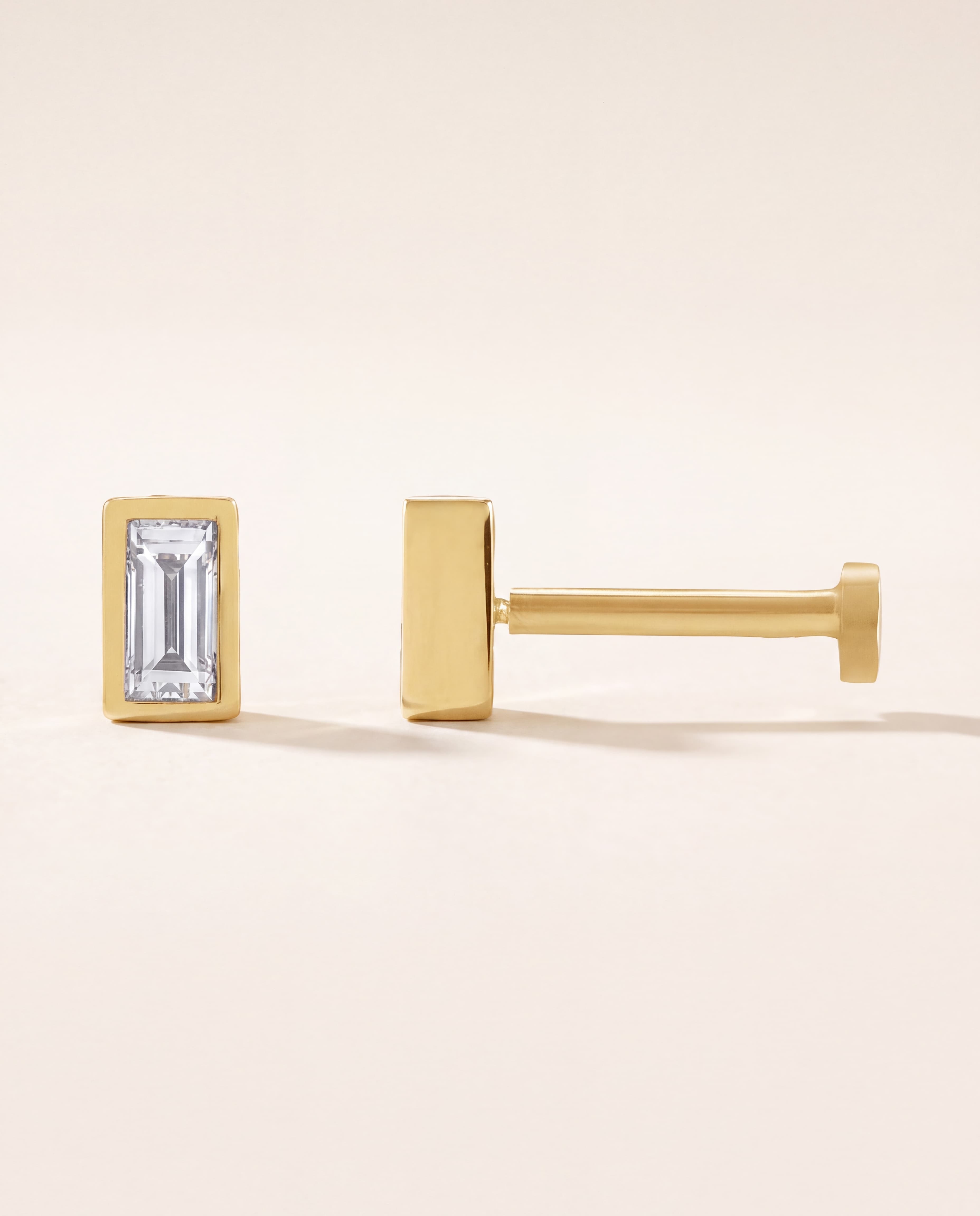 Baguette Bezel Stud Earrings in yellow gold
