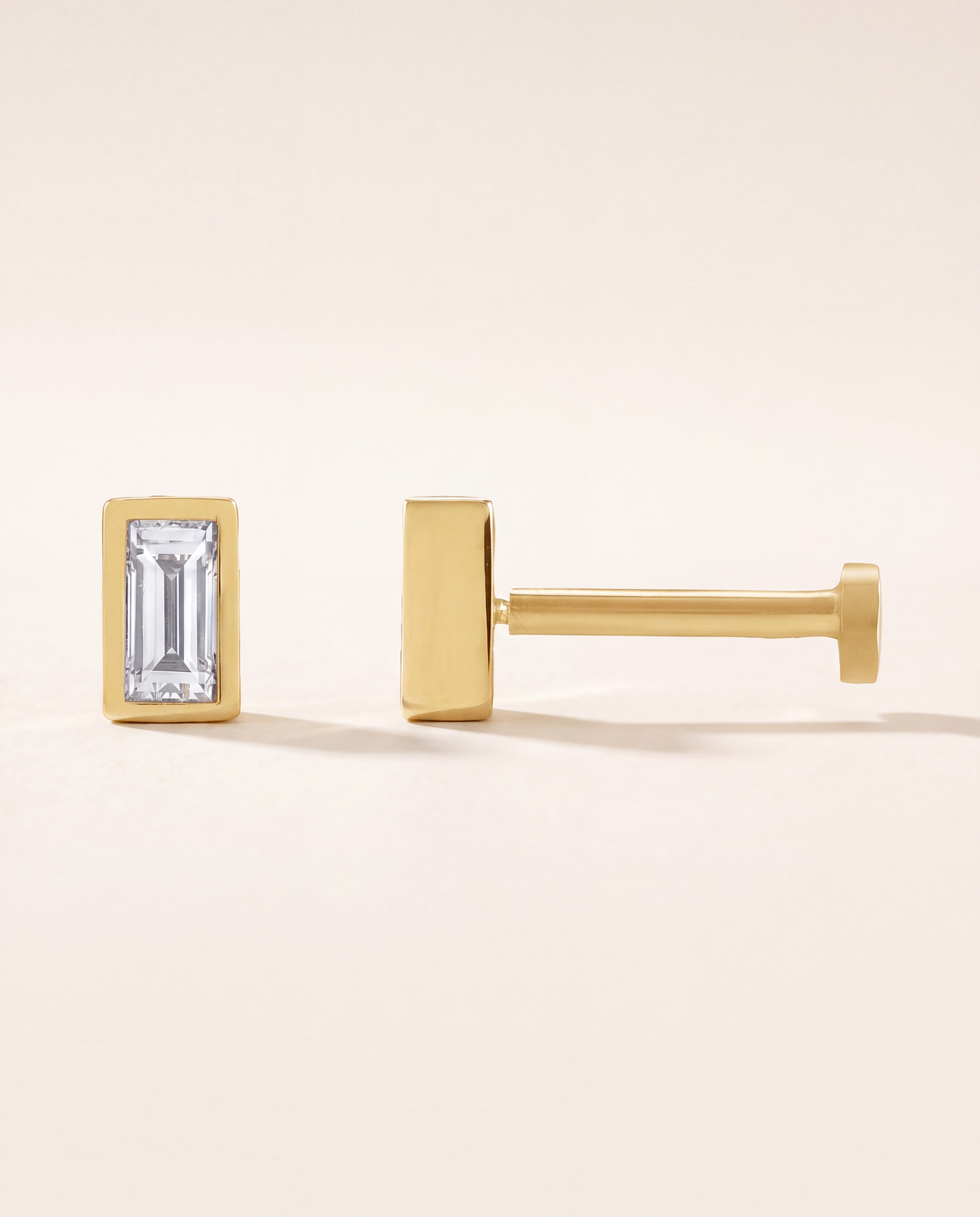 Baguette Bezel Stud Earrings in yellow gold