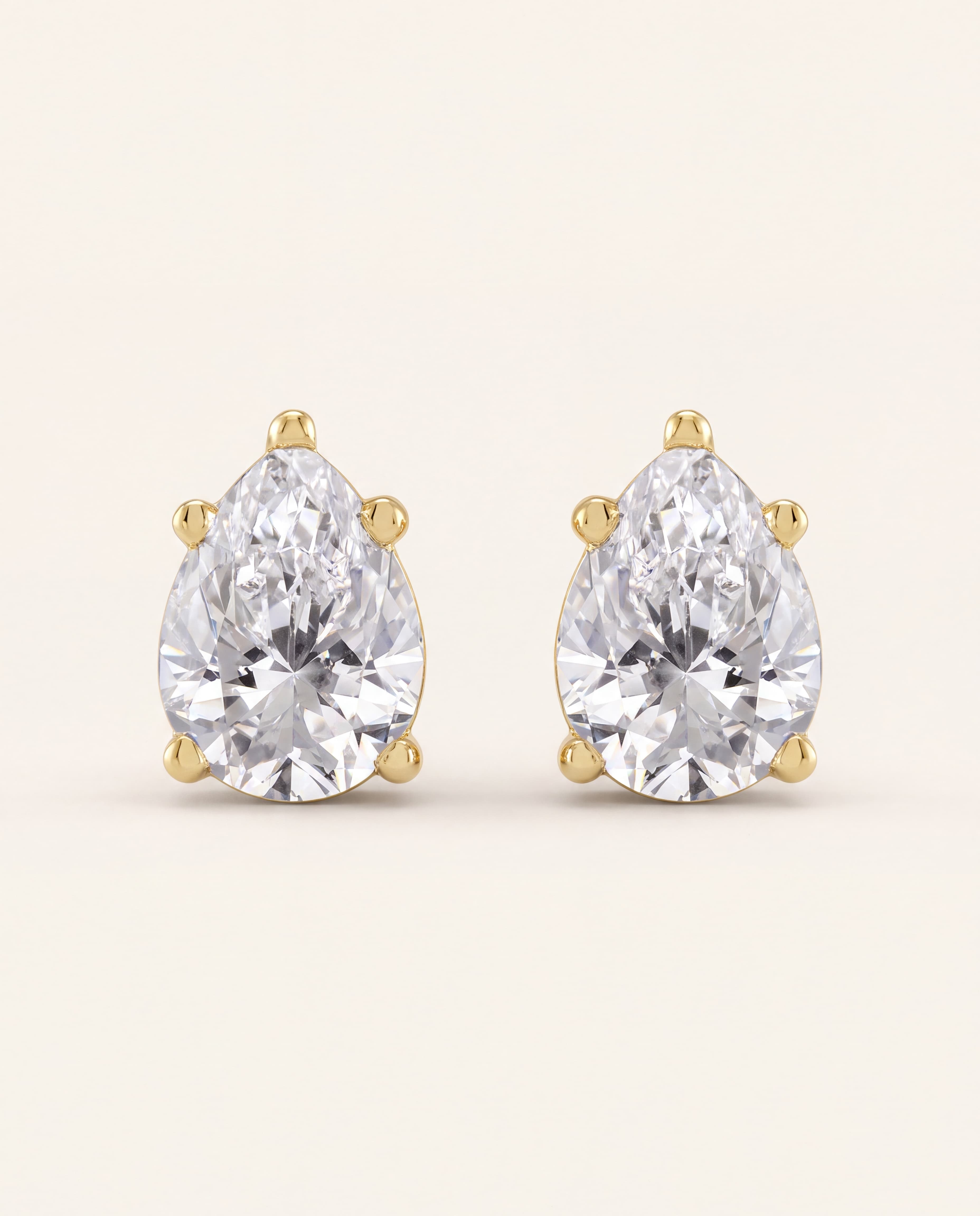 Pear-Cut Diamond Stud Earrings – 5/8 CT. TW, studio photograph