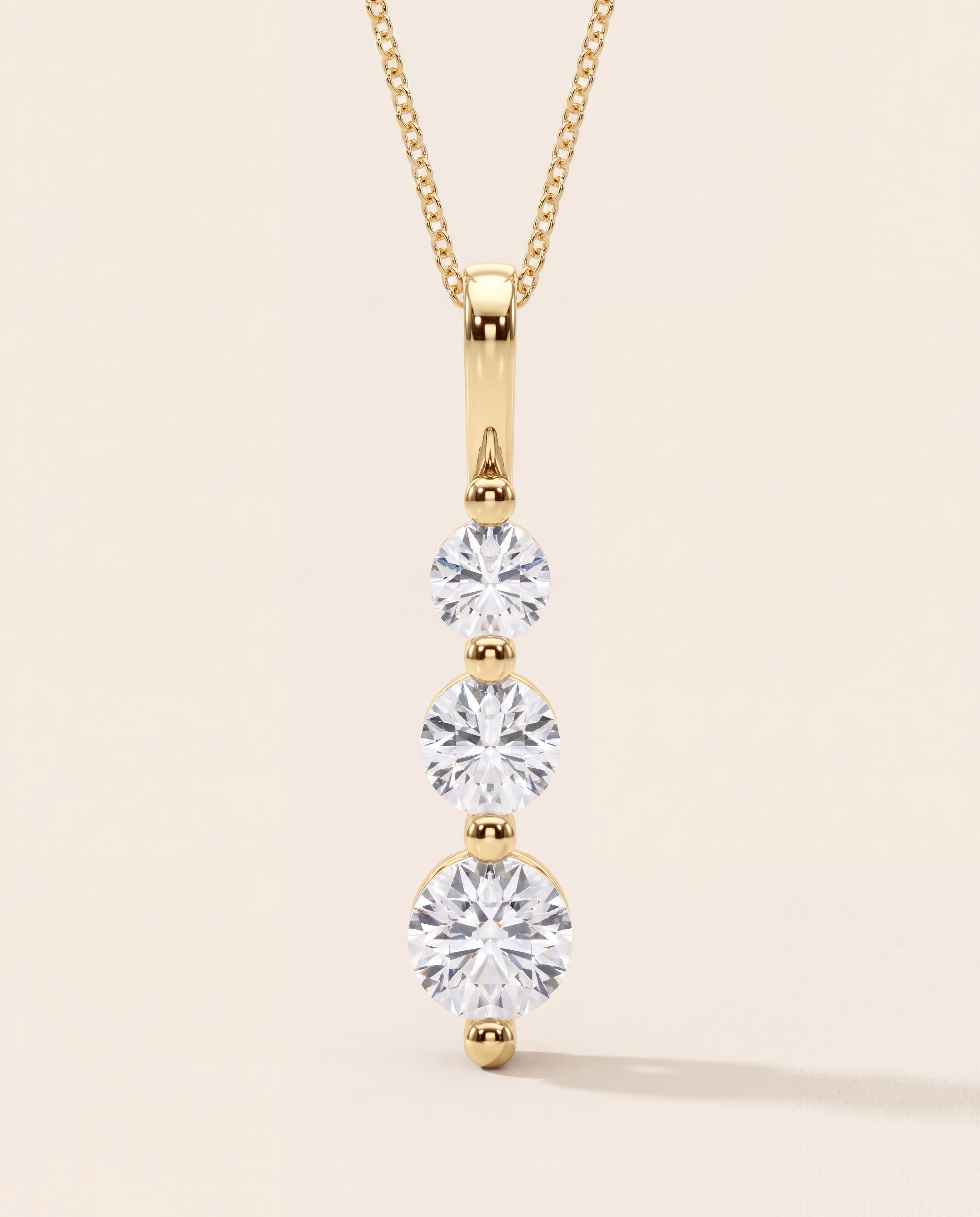 Three-Stone Diamond Drop Necklace – 1.00 CT. TW, studio photograph