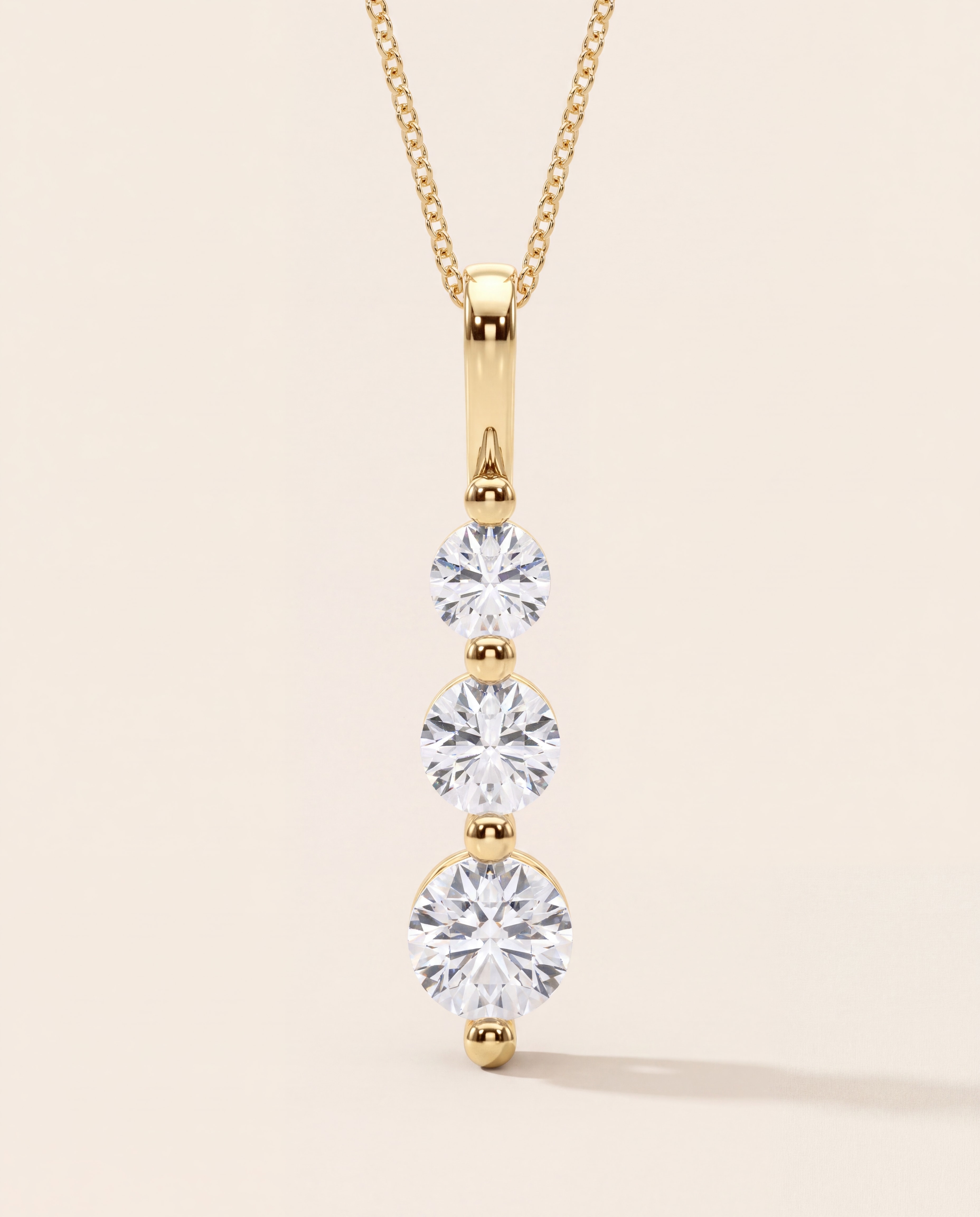 Three-Stone Diamond Drop Necklace – 1.00 CT. TW, studio photograph
