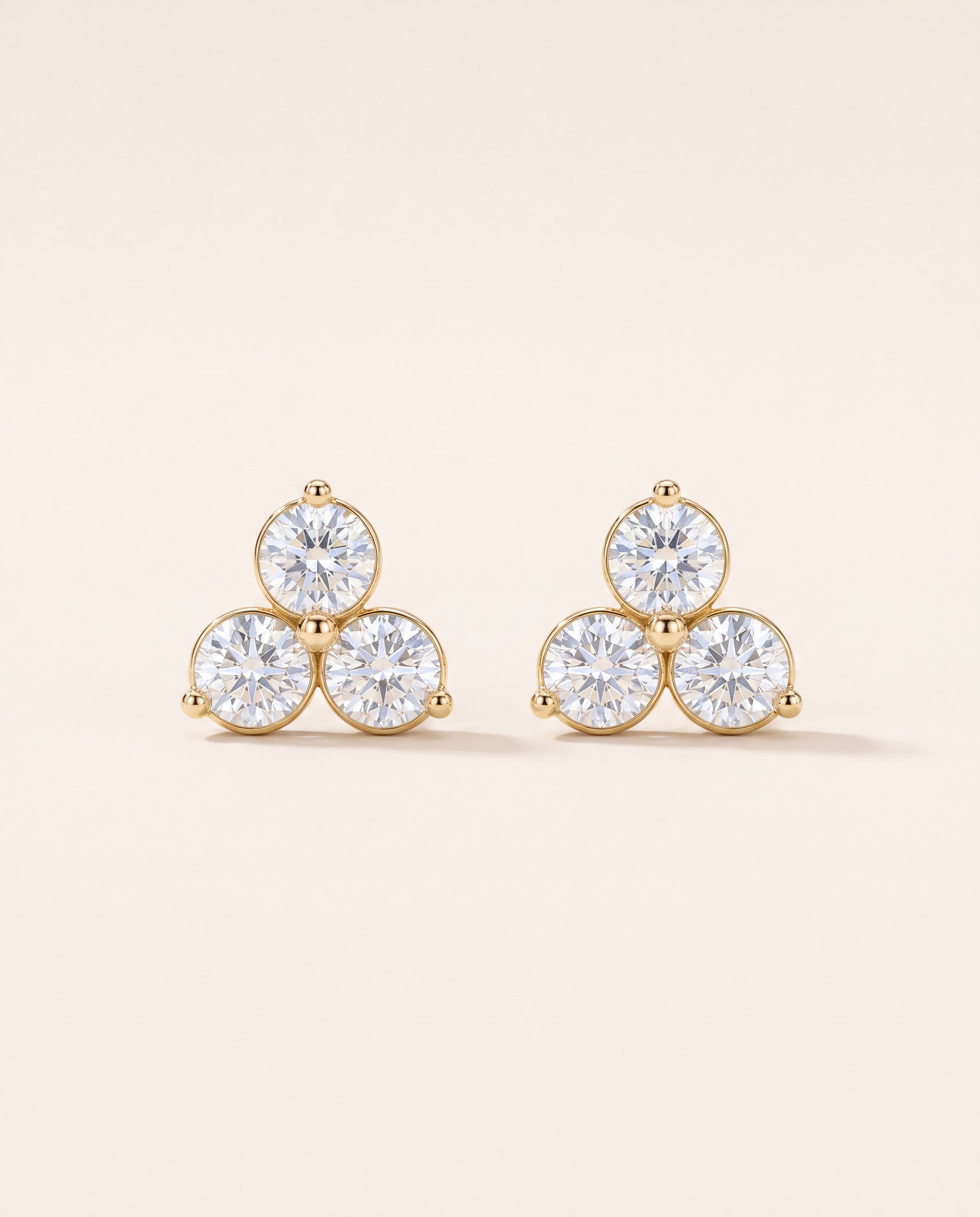 Three-Stone Stud Earrings – 1/4 CT. TW, studio photograph