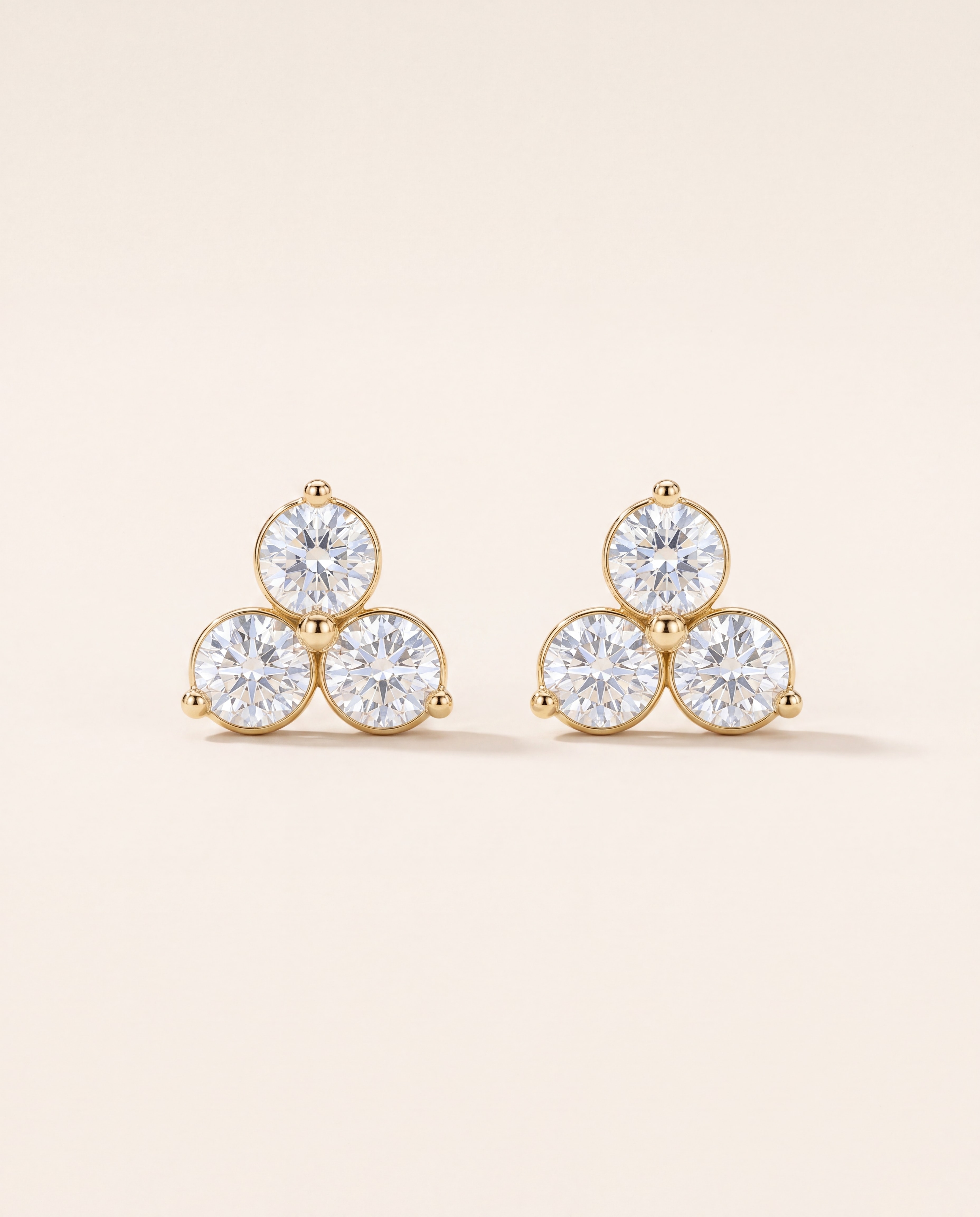 Three-Stone Stud Earrings – 1/4 CT. TW, studio photograph